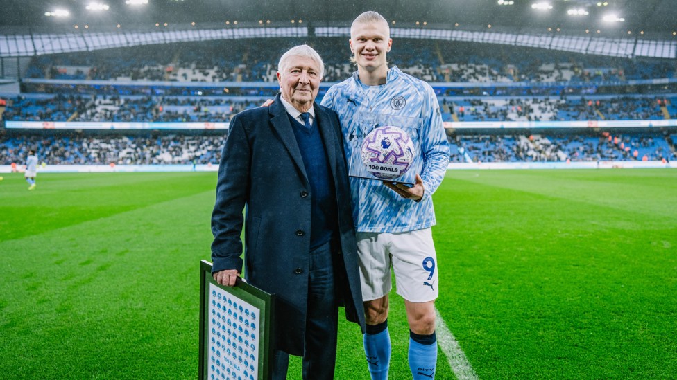 CENTURION : Mike Summerbee presents Haaland with a special match ball marking his 100 Premier League goals before kick-off.
