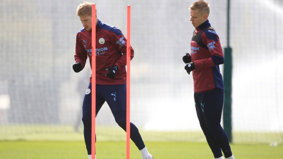 DOUBLE TROUBLE: Kevin De Bruyne and Oleksandr Zinchenko limber up