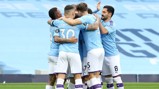 GROUP HUG: The players share the love after Silva's early goal.
