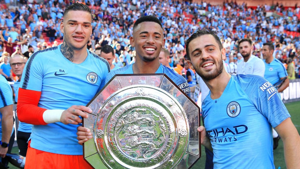 2018: Ederson, Gabriel Jesus and Bernardo Silva celebrate last season's Community Shield success.