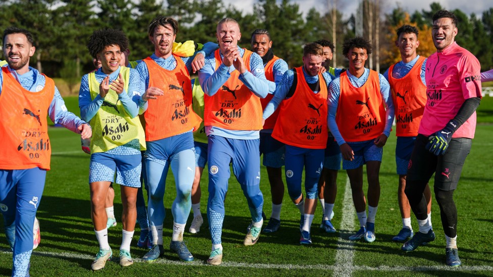 LAUGHING ALONG : Something grabs Erling's attention while lining up for a photo