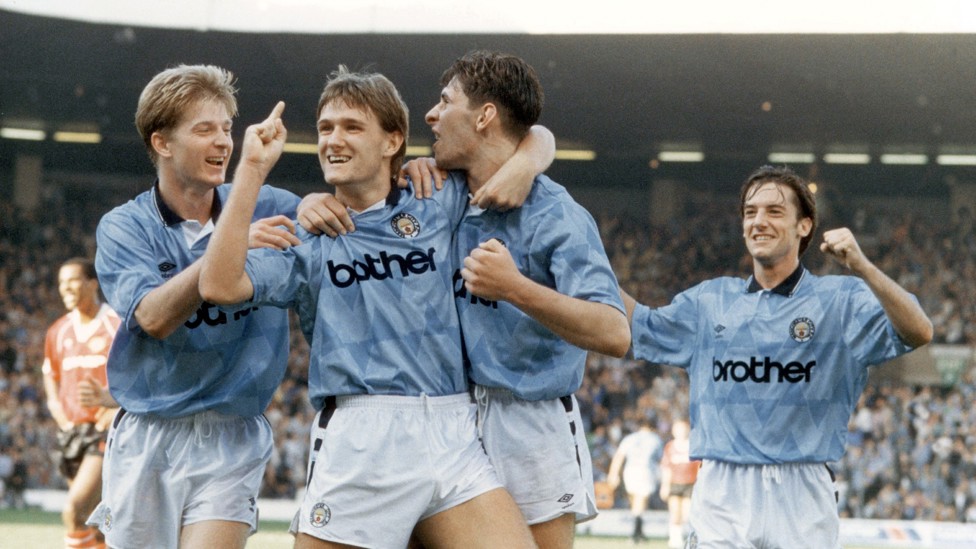 High five! : City celebrate our fifth of the game...