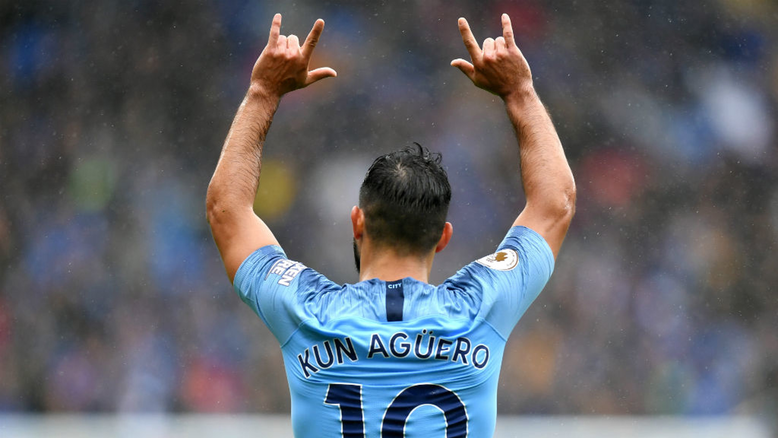 SERGIO SALUTE: Aguero celebrates a goal on his 300th appearance