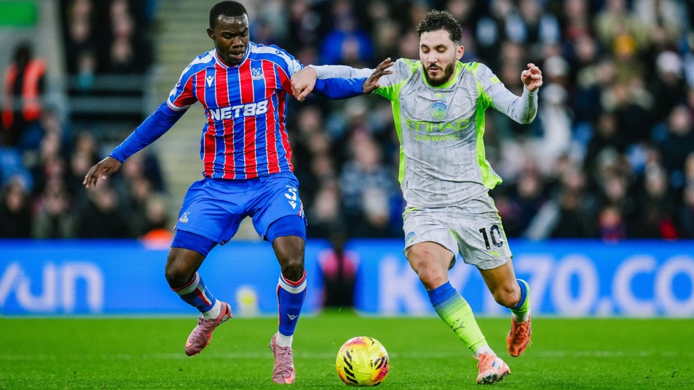 BATTLING IT OUT: Rayan Cherki fends off competition