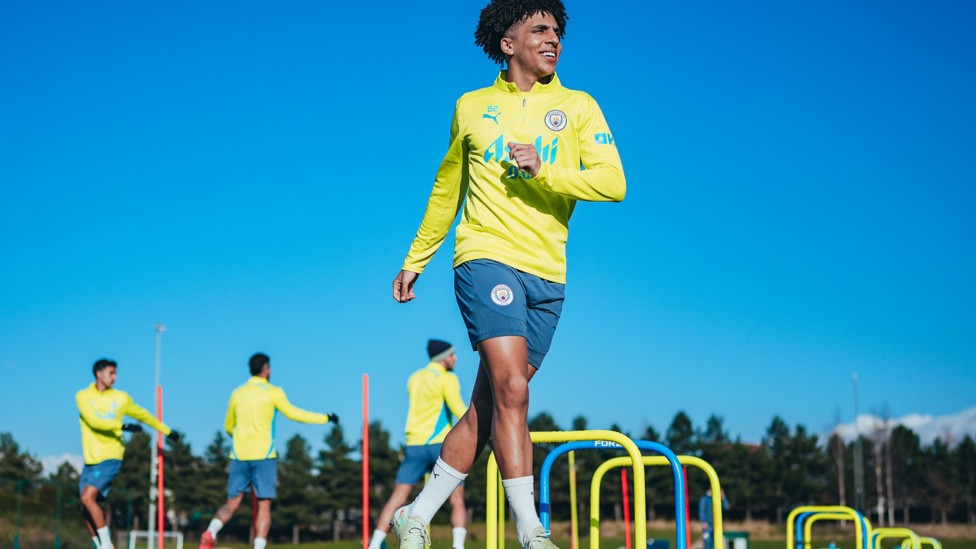 IN THE STICKS : Rico Lewis warms up