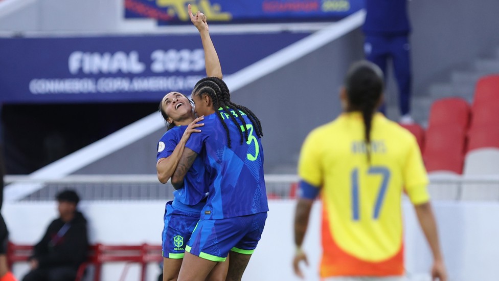 NEVER GIVE UP:  Marta Vieira celebrates with Tarciane dos Santos after scoring the team's third equaliser