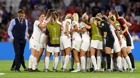 TOGETHER: England unite in a huddle after the game, in a symbol of solidarity