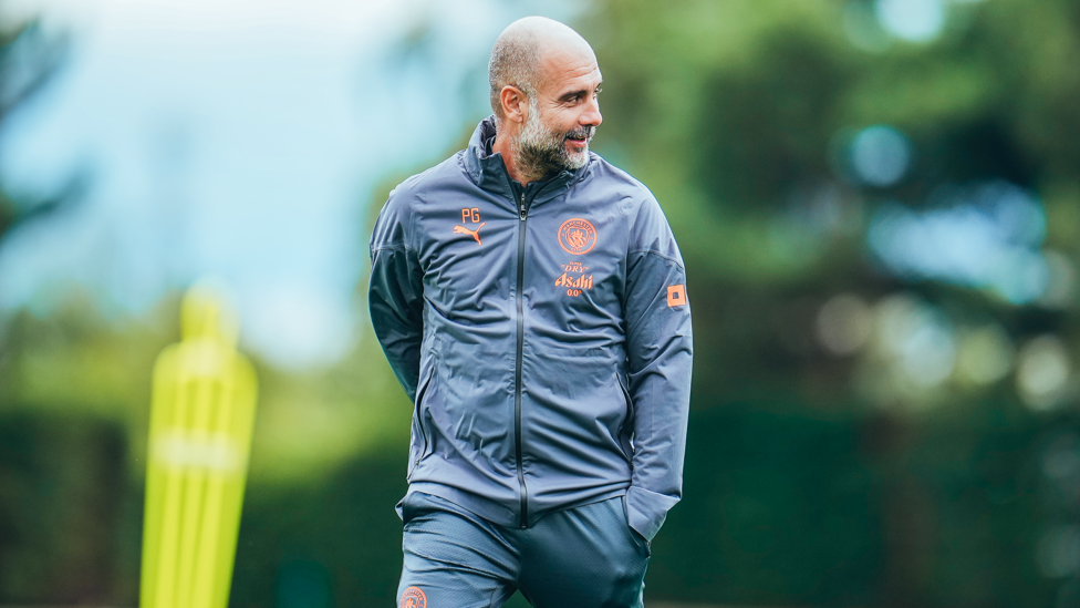 MARCH TO THE ARCH  : Pep Guardiola watches on ahead of our meeting with Arsenal.