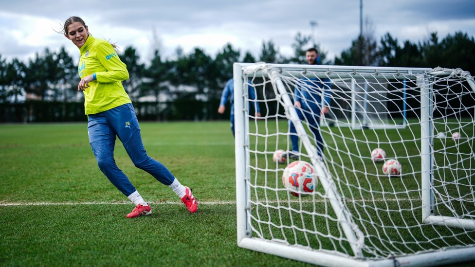 TUCKED AWAY : Gracie Prior turns the ball home