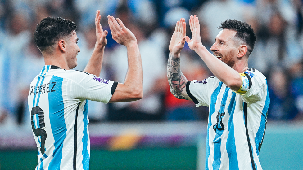 MIDAS TOUCH : Alvarez is congratulated bu Lionel Messi after the pair combine for Argentina's third against Croatia