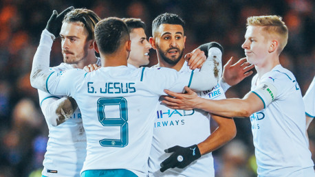 MAIN MAN: Mahrez celebrates with his teammates.