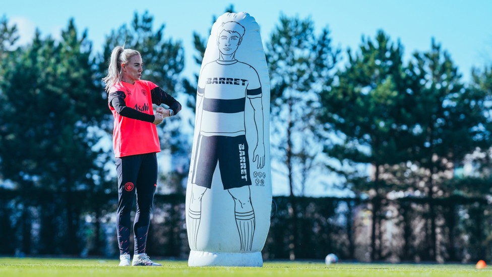 SHOULDER TO SHOULDER : Alex Greenwood's opposition asked for a hug?