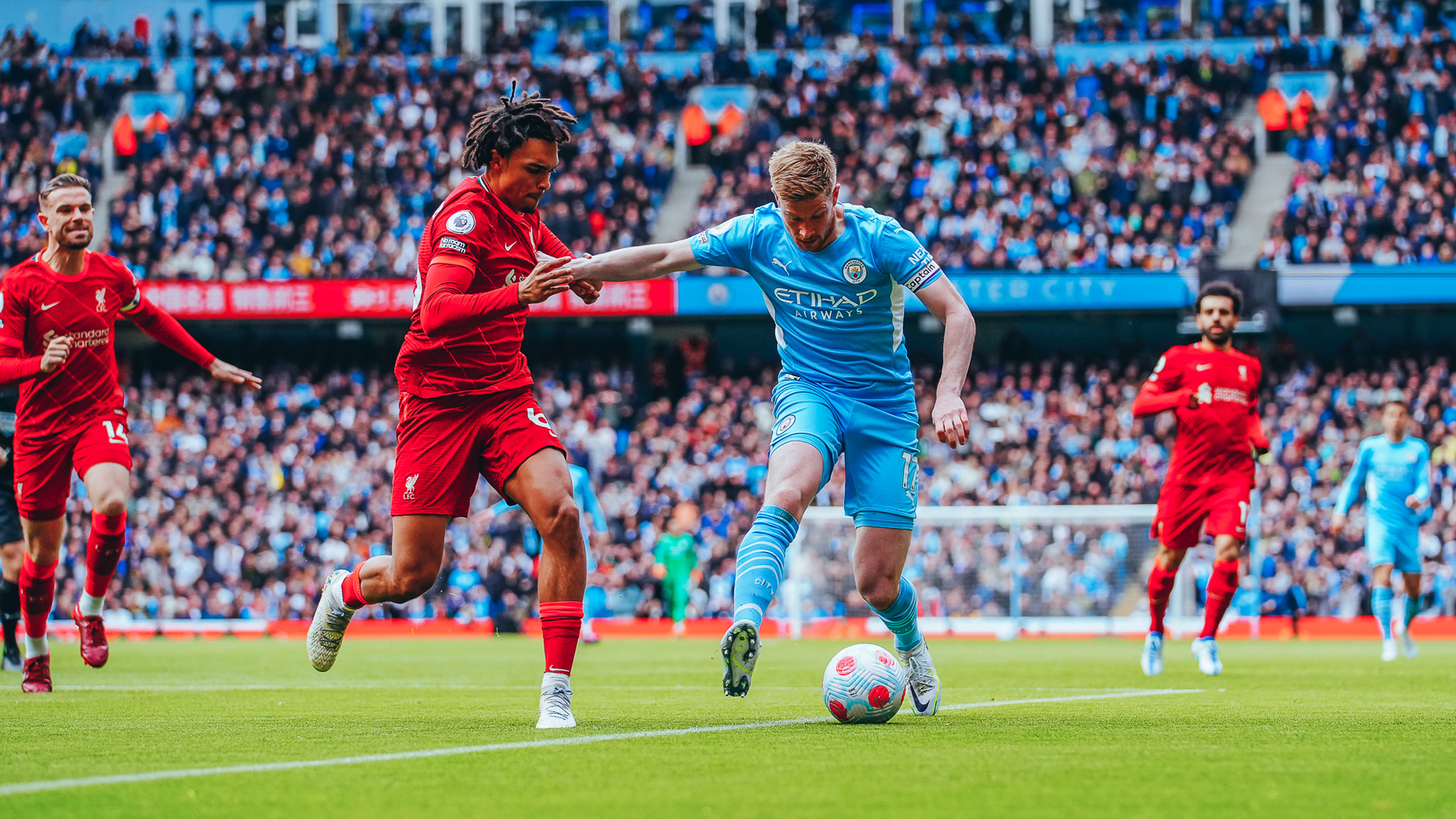 City stay top after thrilling draw with Liverpool