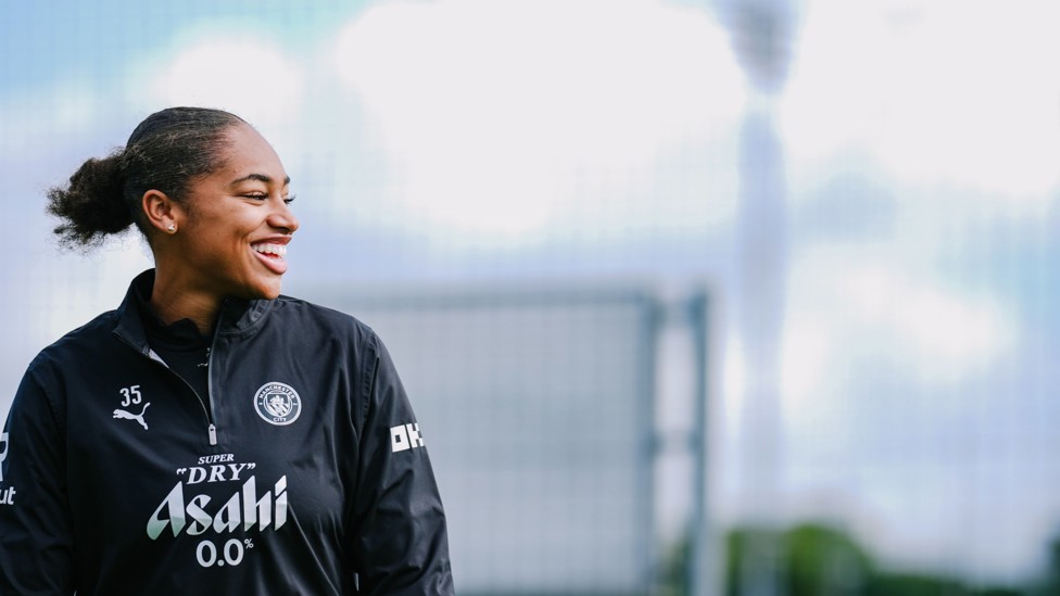 SUN AND SMILES : Khiara Keating makes her way out to training.