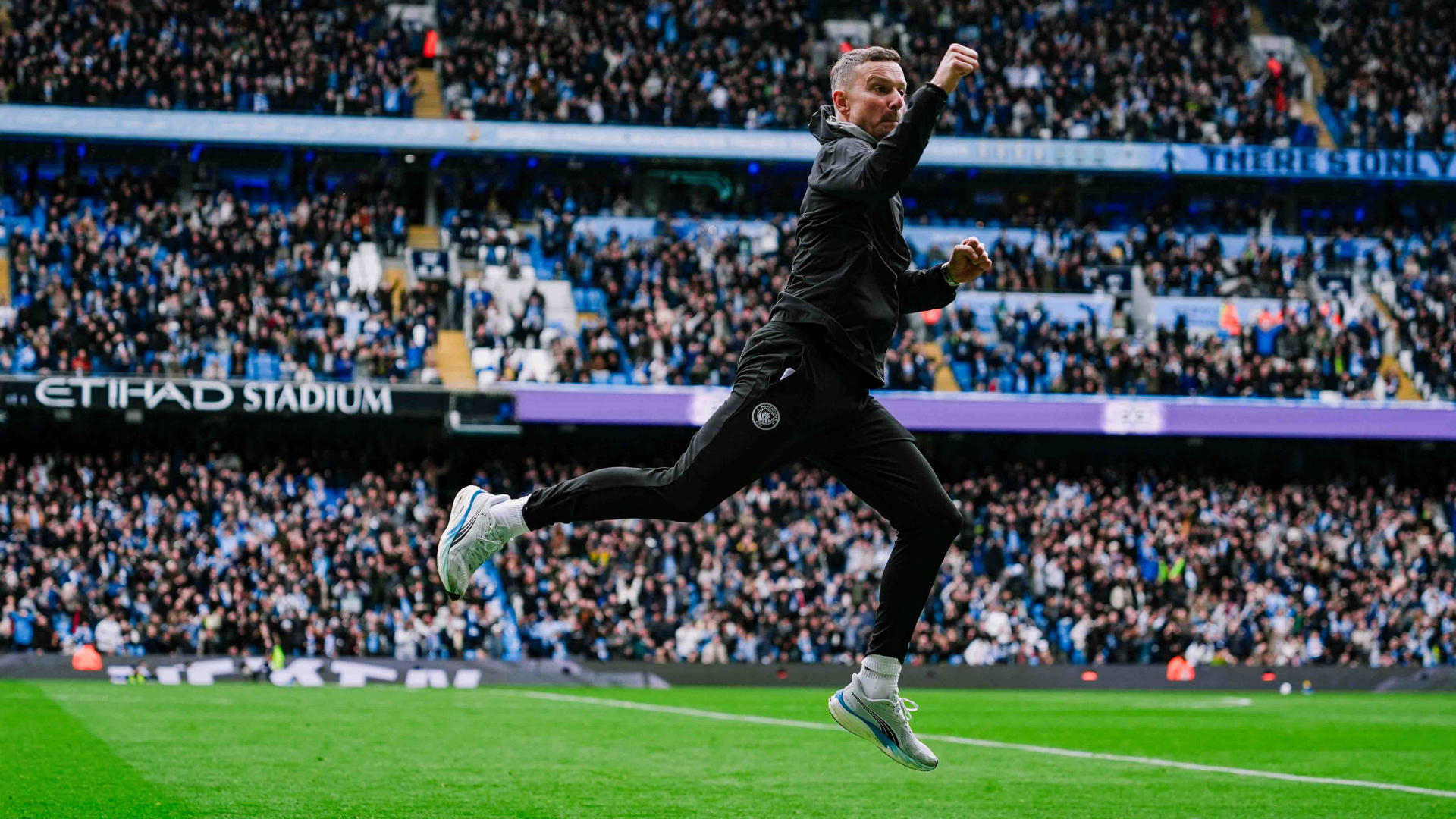 JUMPING FOR JOY: Pep Lijnders summed up the Etihad mood!
