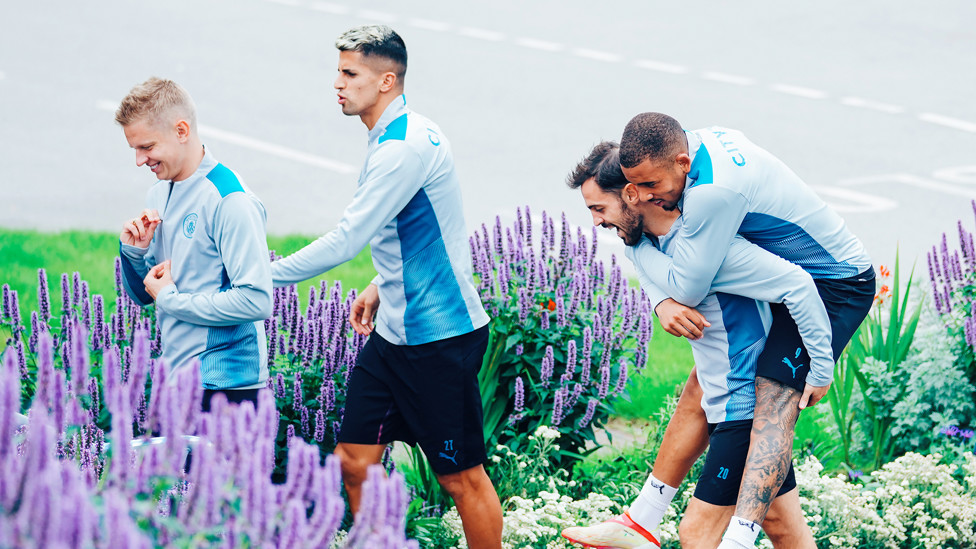 AT ONE WITH NATURE : Plenty of smiles as the lads make their way onto the pitch