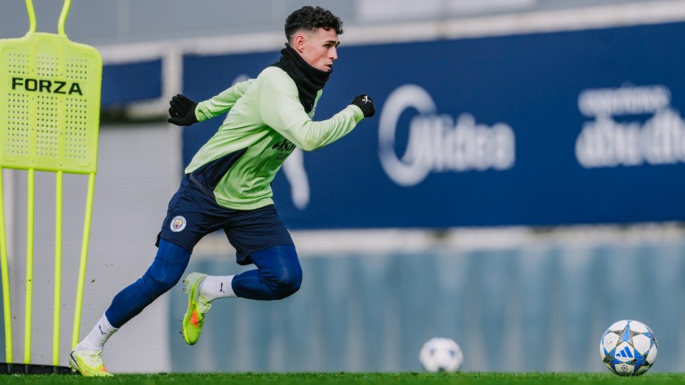 MIDDLE MARCH: Phil Foden springs into top gear.