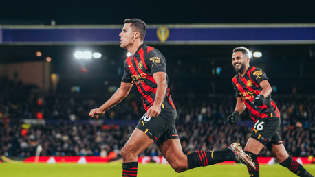 DEADLOCK BROKEN: Rodri wheels away to celebrate his goal in first-half stoppage time.