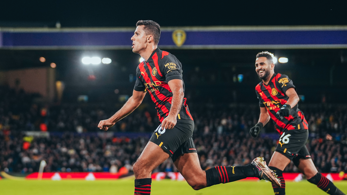 DEADLOCK BROKEN: Rodri wheels away to celebrate his goal in first-half stoppage time.