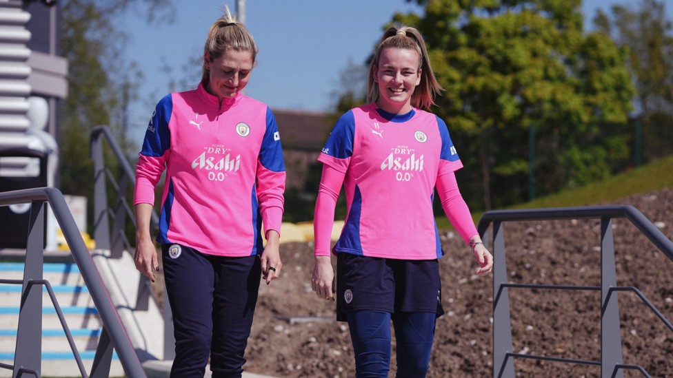 DYNAMIC DUO : Laura Coombs and Lauren Hemp make their way out for training