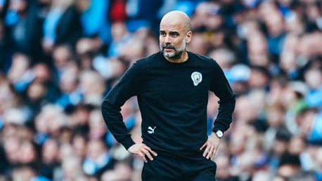THE BOSS: Guardiola watches on from the touchline.