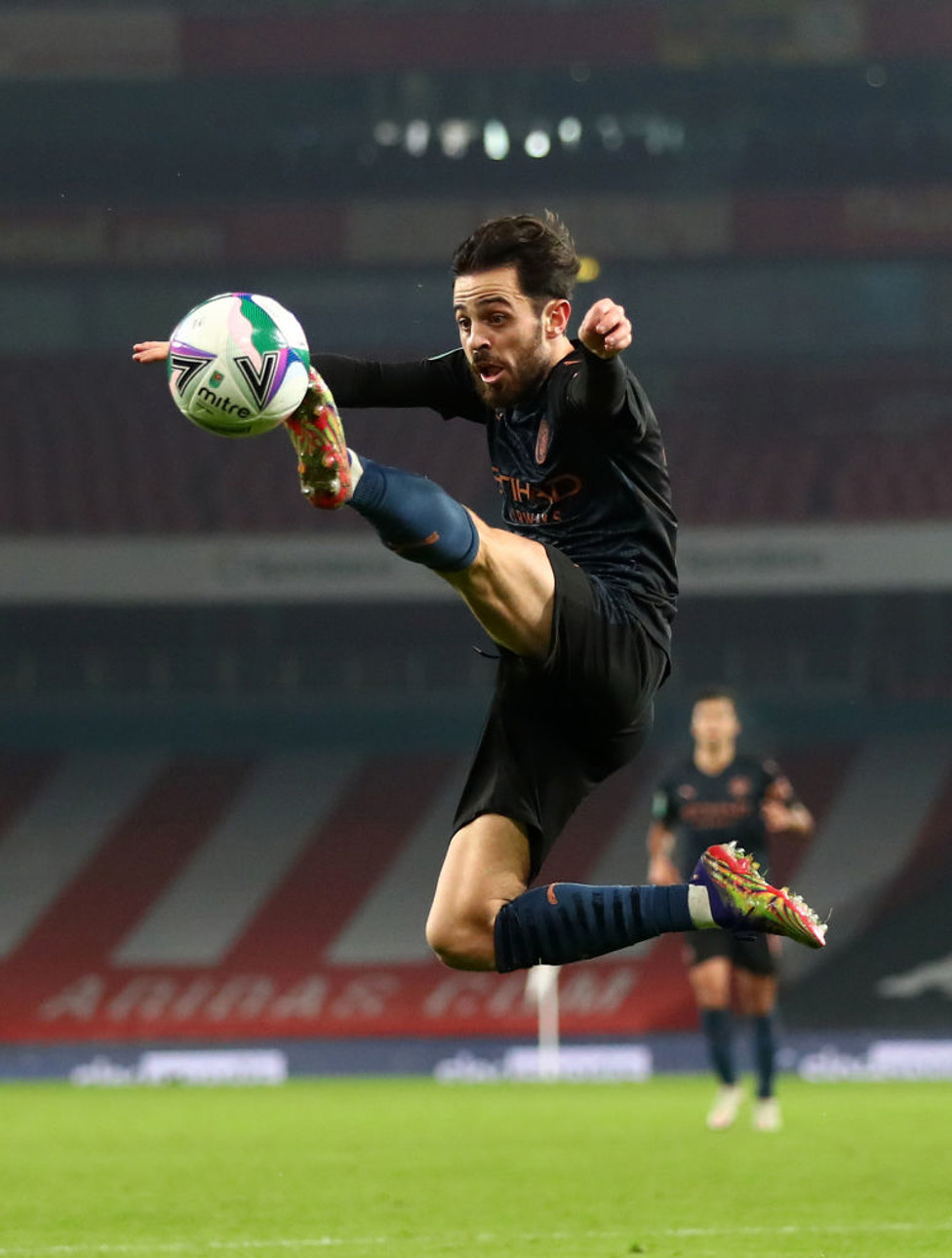 SILVA STRETCH: Bernardo Silva looks to get on the end of an aerial ball
