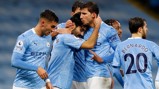 FESTIVE SPIRIT: The players share the love after Gundogan's composed finish.
