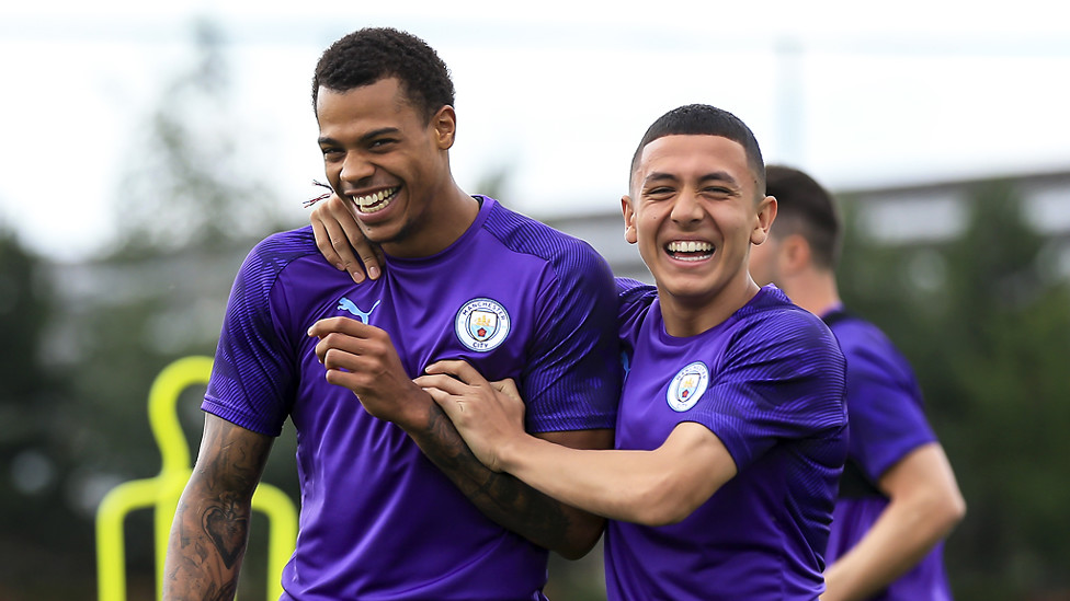 SMILE LIKE YOU MEAN IT : Lukas Nmecha and Ian Poveda enjoy a joke