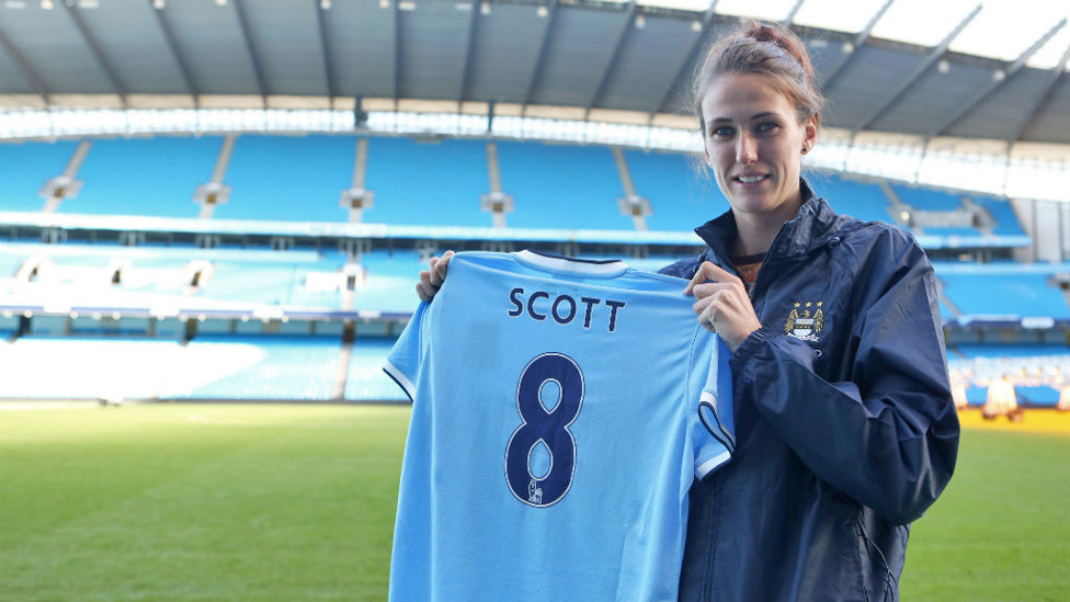 NUMBERS GAME: Jill proudly holds her City shirt aloft after signing for us on November 15th, 2013