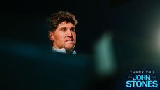 Blurred image of a person with text 'Thank You John Stones 2016-2026'.