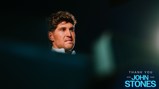 Blurred image of a person with text 'Thank You John Stones 2016-2026'.