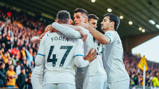 GROUP HUG: Feeling the love after the opening goal.