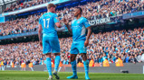 DEADLY DUO: The two scorers celebrate.
