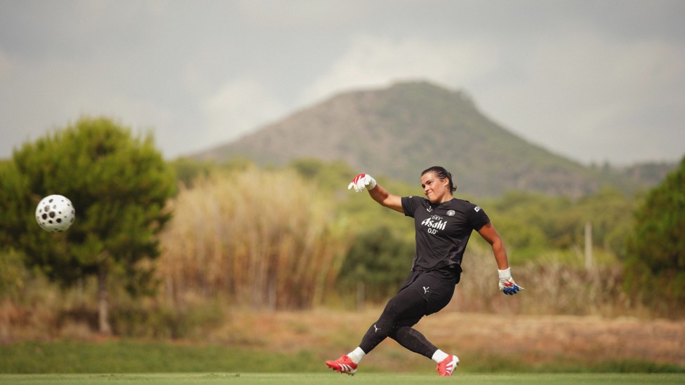 KICK WITH A VIEW: Eartha Cumings takes a goal-kick against a stunning backdrop