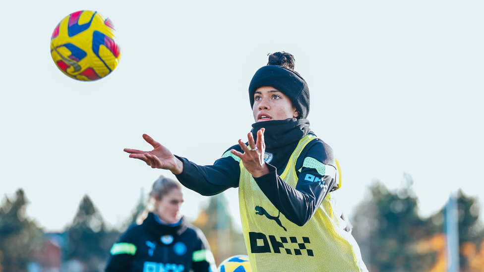 SAFE HANDS : Mary Fowler watches the ball in flight