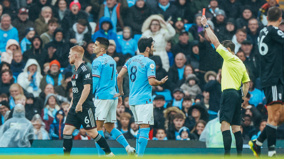 RED MIST : Cancelo is shown a straight red card for bringing down Wilson inside the box.