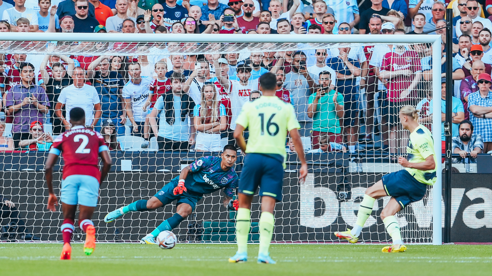 OFF THE MARK : Haaland strokes in his first City goal from the penalty spot after being tripped by Areola.