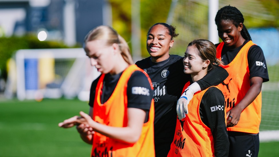 SMILES ALL ROUND : Khiara Keating and Yui Hasegawa enjoy the sun