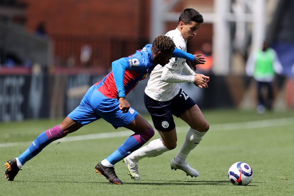 WING WONDERS : Joao Cancelo and Wilfried Zaha lock horns