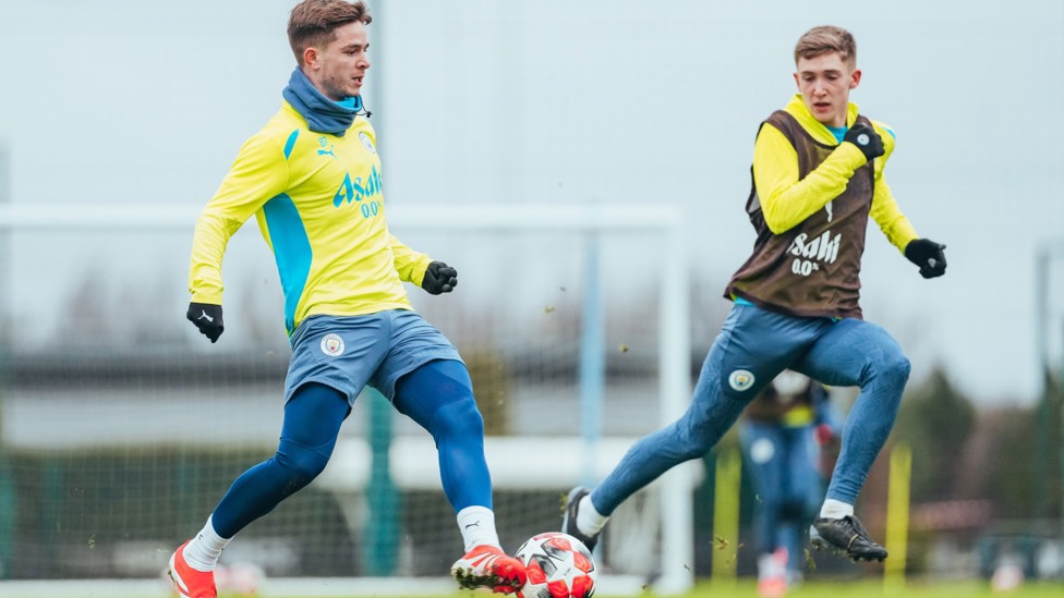 PICK A PASS : James McAtee looks for a team-mate