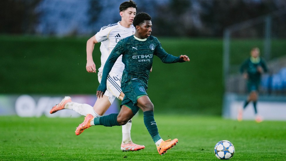 PULLING THE STRINGS : Ryan McAidoo makes a darting run as City push for a second.