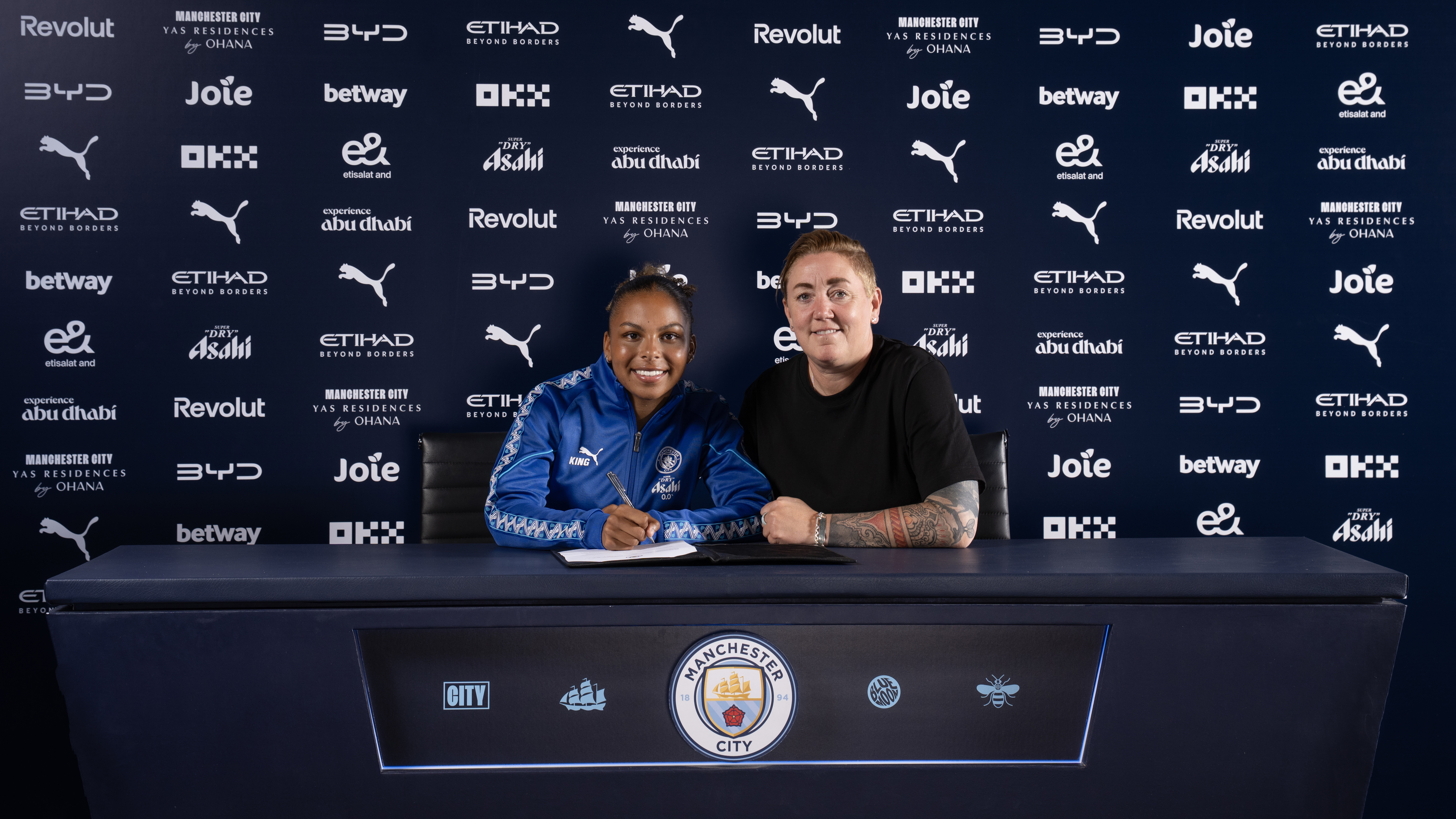 Lewis signs first professional deal