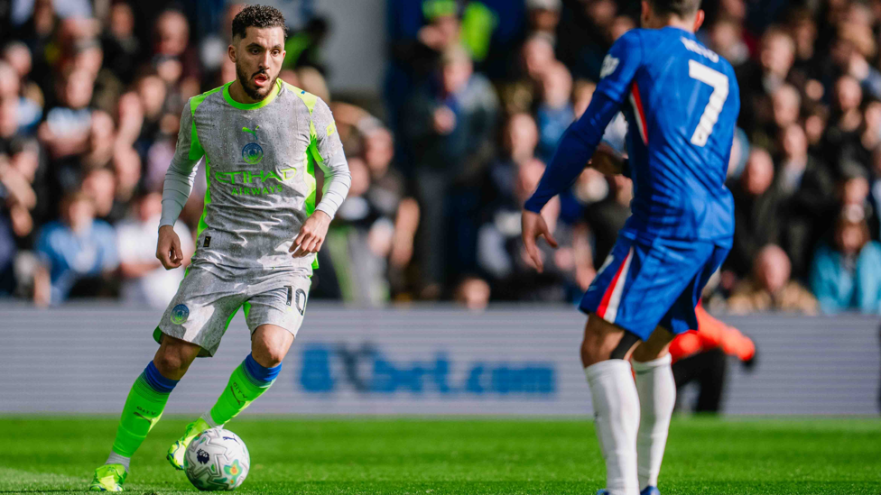 MIDFIELD MAESTRO : Cherki looking to unlock the Chelsea defence.