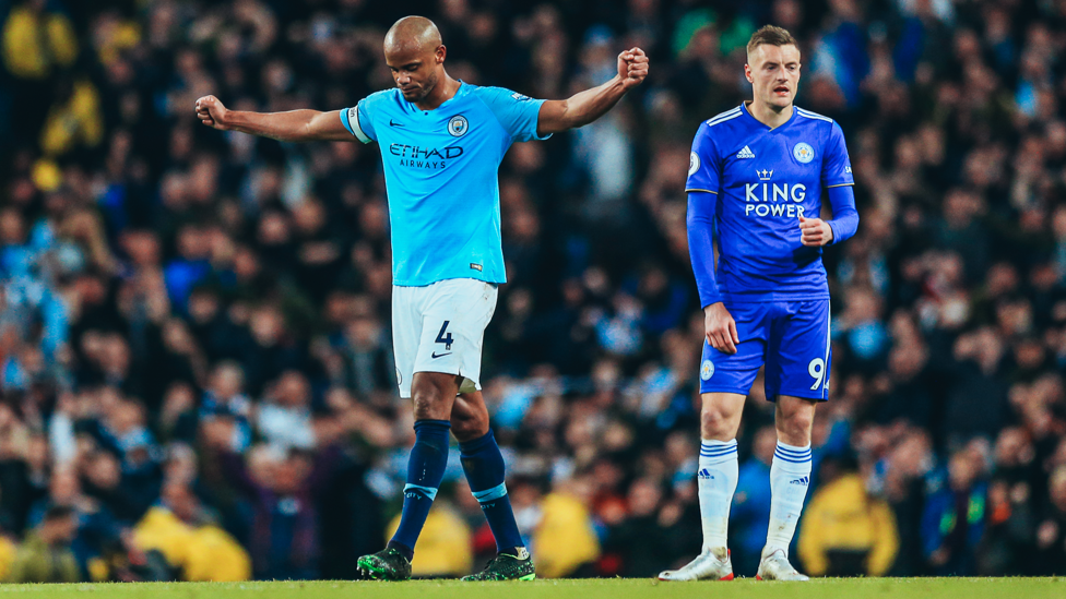 CAPTAIN, LEADER, LEGEND : Vincent Kompany holds his arms out wide in the pose now immortalised by his statue