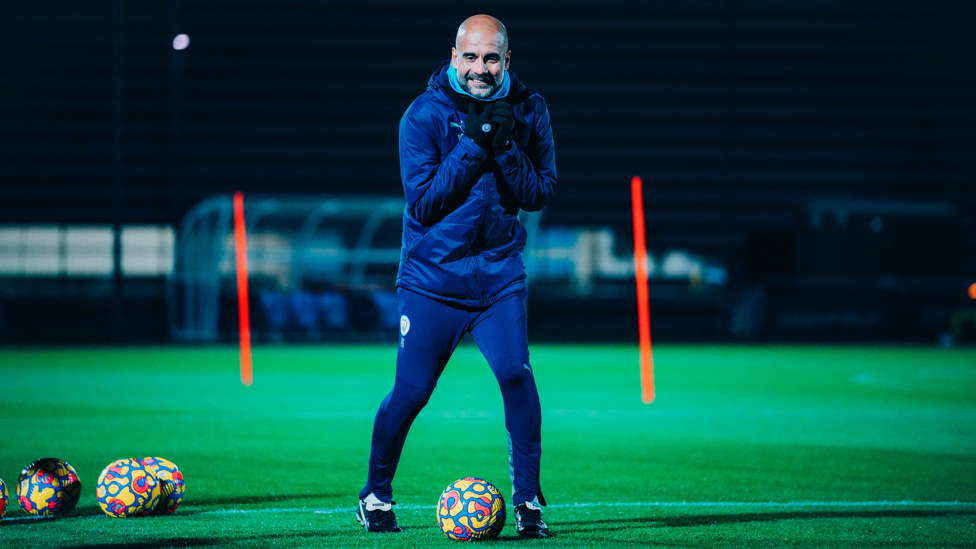 GLAD ALL OVER : Pep Guardiola's happy to be back!