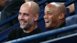 DOUBLE ACT: Pep Guardiola and Vincent Kompany are glad to see a late draw