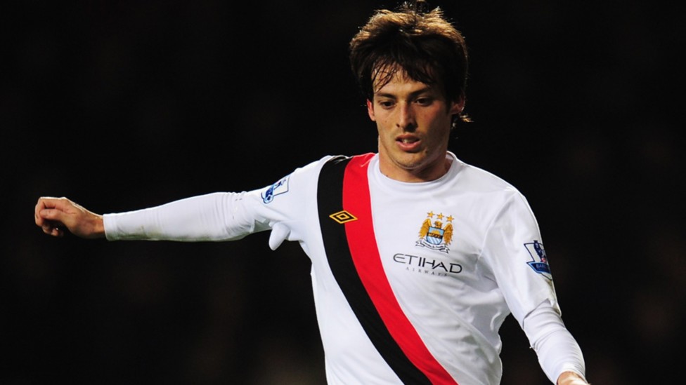 EL MAGO! David Silva weaves another spell of magic whilst adorned with the red and black diagonal sash back in 2011. 