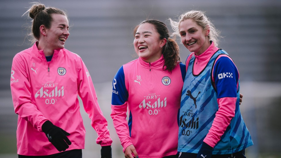THREE CHEERS: Lauren Hemp, Aemu Oyama and Laura Coombs share a light-hearted moment.