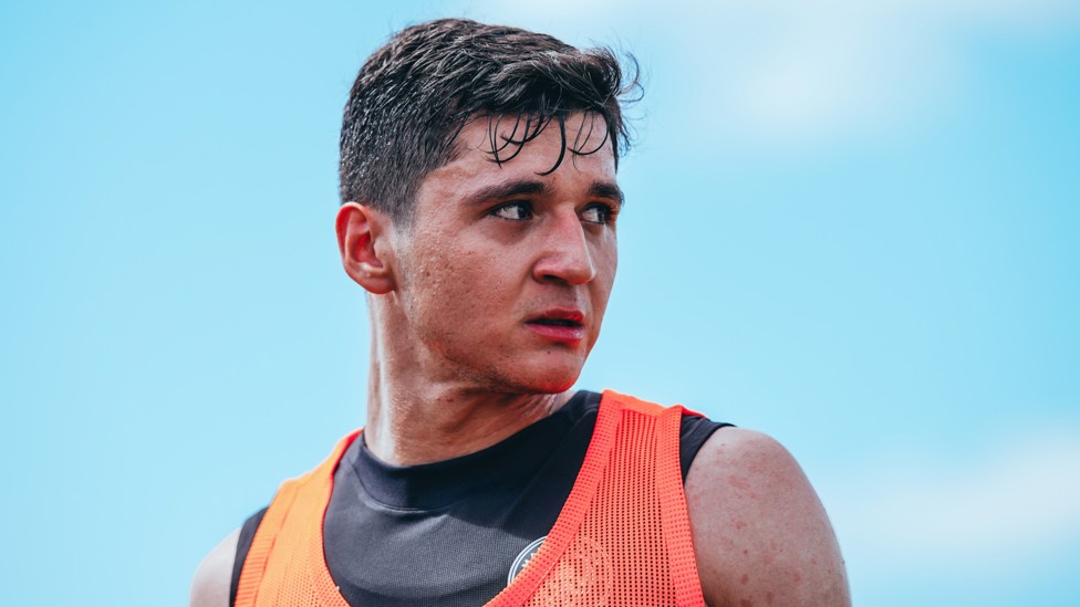 SWEAT IT OUT : Khusanov putting in the effort