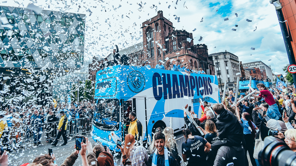 CHAMPIONS: A ticker tape reception greets the squad